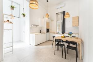 Kuchyňa alebo kuchynka v ubytovaní Maison de Fashion Apartment