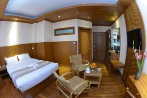 Televisyen dan/atau pusat hiburan di Hotel Sidney