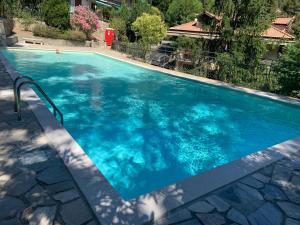 The swimming pool at or close to CASETTA DEI RICCI