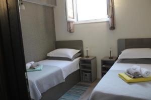 Ένα ή περισσότερα κρεβάτια σε δωμάτιο στο Kuća za odmor R&A