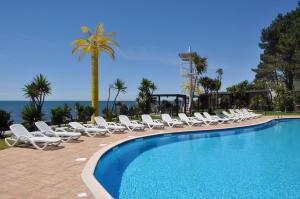 The swimming pool at or close to Andamati Beach Resort