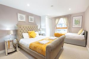 Ένα ή περισσότερα κρεβάτια σε δωμάτιο στο Cartier House at the Leeds Dock