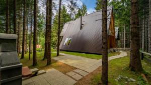 Zahrada ubytování Forest House Stella - A frame cabin
