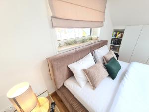 Posteľ alebo postele v izbe v ubytovaní Apartament Royal Szczyrk