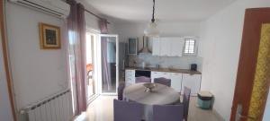 Kuchyň nebo kuchyňský kout v ubytování Apartment Grubišić + 31 fotografií