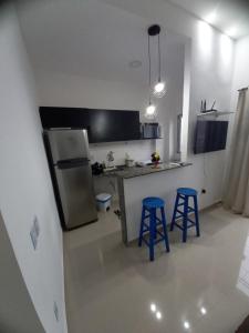 Kjøkken eller kjøkkenkrok på VidigalHouse apartamento Vista Mar 2