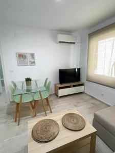 A television and/or entertainment centre at Piso Azonaicas Centro Tendillas