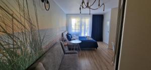 Część wypoczynkowa w obiekcie Apartamenty Hexagon nr 11