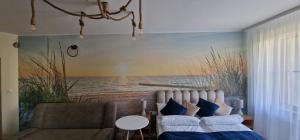 Łóżko lub łóżka w pokoju w obiekcie Apartamenty Hexagon nr 11