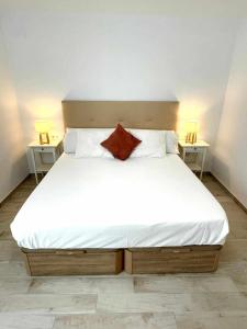 A bed or beds in a room at Piso Azonaicas Centro Tendillas