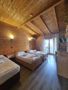 Postel nebo postele na pokoji v ubytování Hotel Adriatik 2