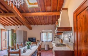 A kitchen or kitchenette at Cozy Home In Barberino Del Mugello