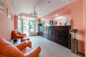 Kuchyň nebo kuchyňský kout v ubytování Hotel Giulia