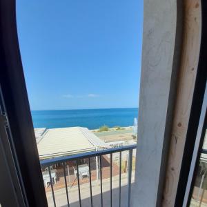 a view of the ocean from a balcony at Azzurromare in San Vito Chietino