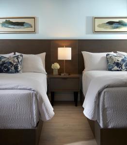 Voodi või voodid majutusasutuse The Pointe Hotel toas