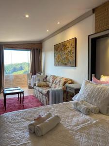 Casa Lavanda - Guest House tesisinde bir odada yatak veya yataklar