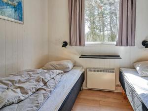 Postel nebo postele na pokoji v ubytování Bright Retreat by the Beach - By Traum Ferienwohnungen