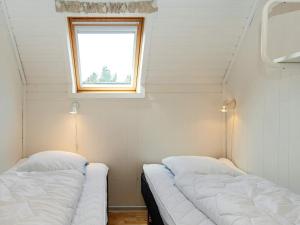 Postel nebo postele na pokoji v ubytování Holiday home Skjern XVIII
