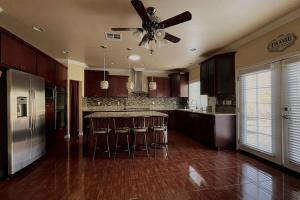 A kitchen or kitchenette at HUGE GORGEOUS UPGRADED HOME IN THE CENTER OF SOCAL
