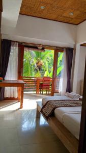 Postel nebo postele na pokoji v ubytování Ubud Dream + 32 fotografií