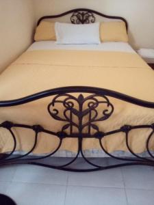 Postel nebo postele na pokoji v ubytování La Casita de Mary
