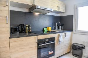Kuchyňa alebo kuchynka v ubytovaní Bail mobilité - Appartement au coeur du Panier