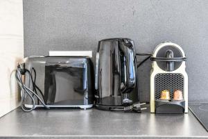 Príslušenstvo na prípravu kávy alebo čaju v ubytovaní Bail mobilité - Appartement au coeur du Panier