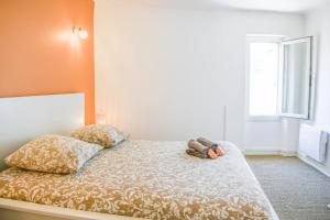 Posteľ alebo postele v izbe v ubytovaní Bail mobilité - Appartement au coeur du Panier