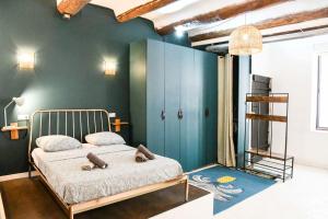 Postel nebo postele na pokoji v ubytování Le Fortia II - Appartement Vieux-Port