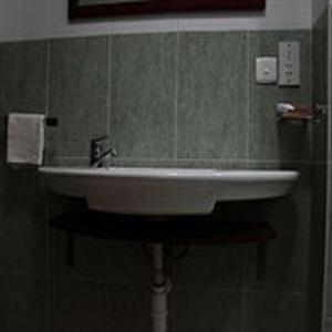 Phòng tắm tại Calabash Green Executive Apartments