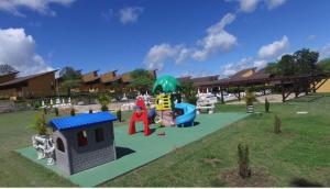 a park with a playground with a play structure at Winterville residence in Gravatá