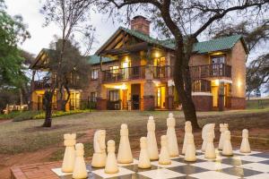 a giant chess board in front of a house at 3-Bedroom House, Greenway Woods, White River in White River