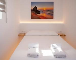 Posteľ alebo postele v izbe v ubytovaní Casa Blu Mykonos