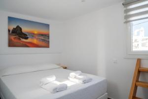 Posteľ alebo postele v izbe v ubytovaní Casa Blu Mykonos
