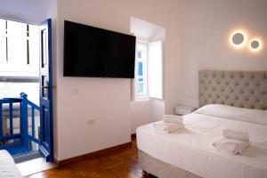 Posteľ alebo postele v izbe v ubytovaní Casa Blu Mykonos