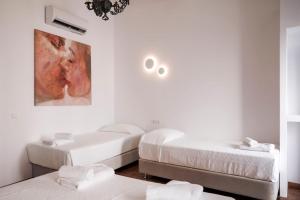 Posteľ alebo postele v izbe v ubytovaní Casa Blu Mykonos