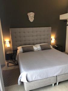 Posteľ alebo postele v izbe v ubytovaní Villa Iiulia Hills