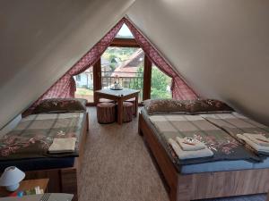 Ein Bett oder Betten in einem Zimmer der Unterkunft Privat LeNa
