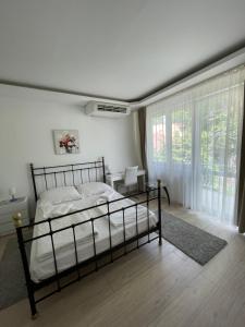 Posteľ alebo postele v izbe v ubytovaní Anna apartman