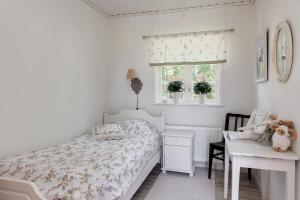 Postel nebo postele na pokoji v ubytování Nice cottage in Sjuhult with proximity to Lake Rymmen