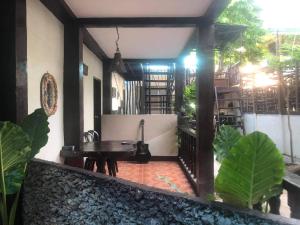 Rõdu või terrass majutusasutuses Mylene Room Rental