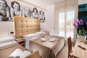 TV a/nebo společenská místnost v ubytování Hotel Lido