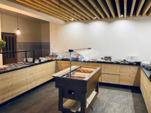 Kuchyň nebo kuchyňský kout v ubytování Hotel Žalý Apartmány