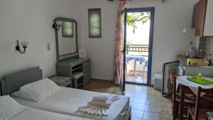 Posteľ alebo postele v izbe v ubytovaní Oasis Apartments