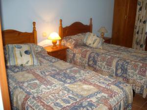 Postel nebo postele na pokoji v ubytování Las Tercias