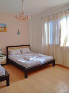 Ένα ή περισσότερα κρεβάτια σε δωμάτιο στο Casa Velipoja