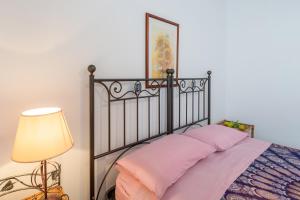 Postel nebo postele na pokoji v ubytování Brezza di limoni