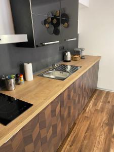 Kuchyň nebo kuchyňský kout v ubytování FiftyShades Apartmán s vířivkou