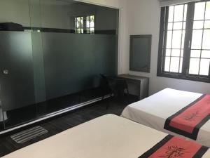 Ein Bett oder Betten in einem Zimmer der Unterkunft Ki Nô Homestay