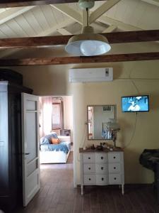 TV a/nebo společenská místnost v ubytování Maro's Guesthouse